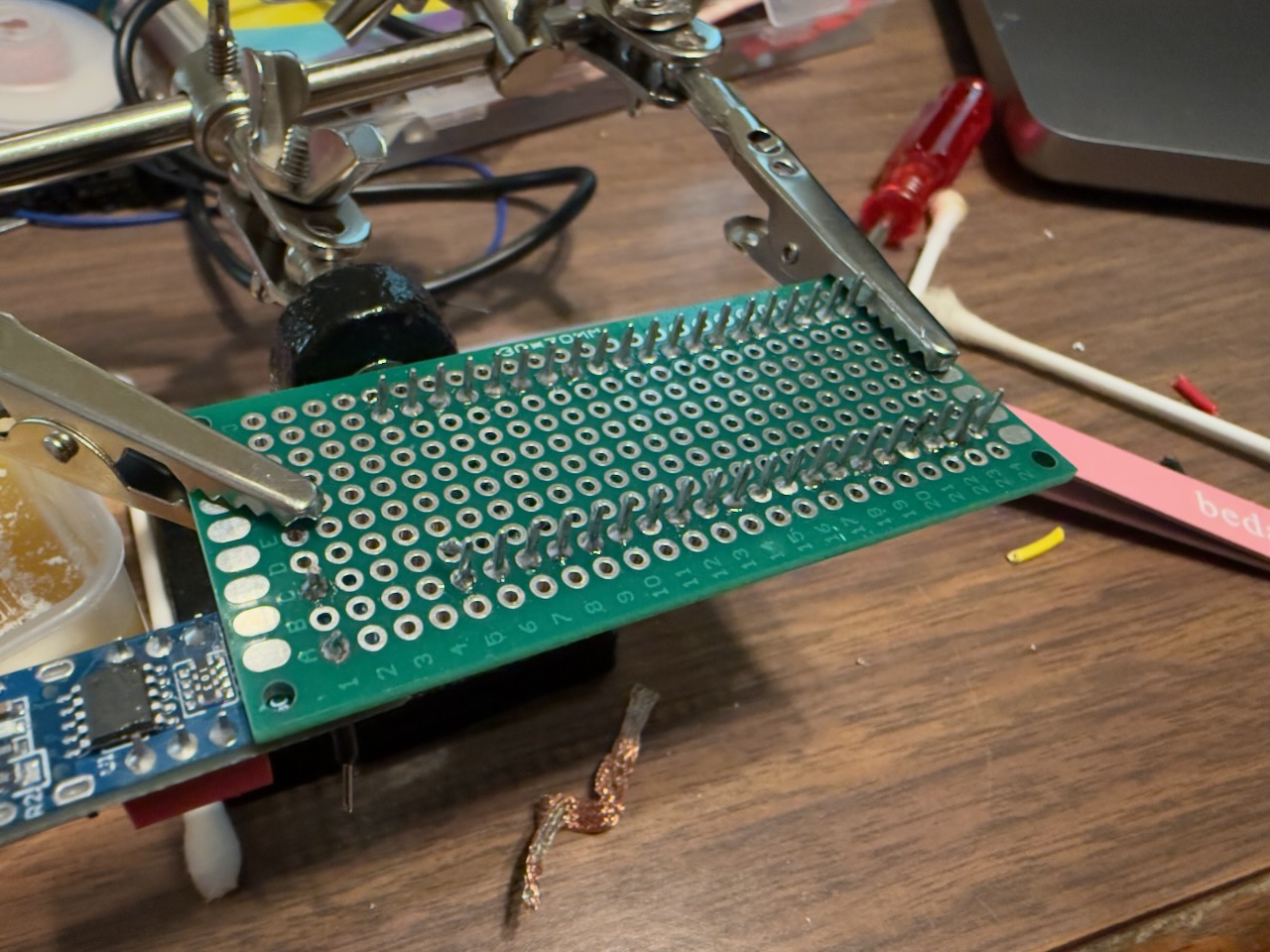 Soldering header pins to the proto board