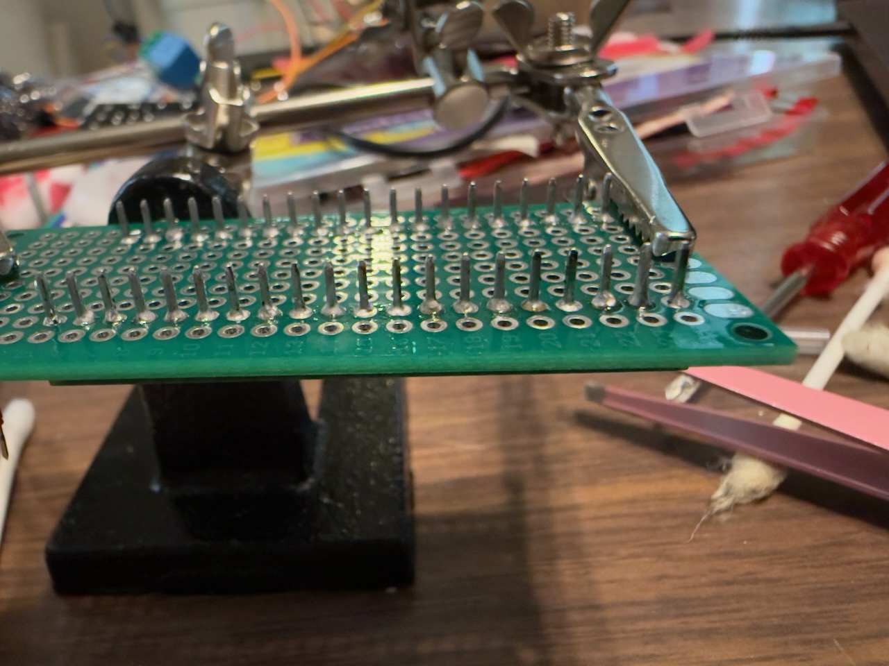 Proto board on 3D stand with pins soldered